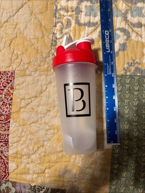 Protein Shaker Bottle with Red Lid and Black Logo